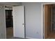 Bedroom with access to bathroom and hallway at 6009 Sea Ranch Dr # 705, Hudson, FL 34667