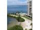 Stunning aerial view of waterfront property with private beach and resort-style pool at 6009 Sea Ranch Dr # 705, Hudson, FL 34667