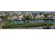 Community overview featuring waterfront homes and lush landscaping at 6009 Sea Ranch Dr # 705, Hudson, FL 34667