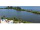 Serene waterfront view with calm water and lush landscaping at 6009 Sea Ranch Dr # 705, Hudson, FL 34667