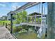 Private boat lift with dock access, perfect for enjoying Florida's waterways at 517 Treviso Dr, Apollo Beach, FL 33572
