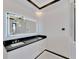 Bathroom with a large vanity and modern lighting at 517 Treviso Dr, Apollo Beach, FL 33572