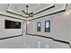 Bright bedroom with marble floors and two large windows at 517 Treviso Dr, Apollo Beach, FL 33572