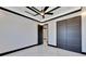 Modern bedroom with marble floors and dark wood doors at 517 Treviso Dr, Apollo Beach, FL 33572