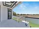 Spacious patio with glass railings and beautiful views at 517 Treviso Dr, Apollo Beach, FL 33572