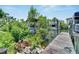 Wooden walkway to private boat dock on a calm waterway at 517 Treviso Dr, Apollo Beach, FL 33572