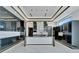 Modern kitchen with sleek black cabinets and expansive island at 517 Treviso Dr, Apollo Beach, FL 33572