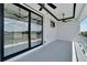 Private balcony with sliding glass doors and scenic view at 517 Treviso Dr, Apollo Beach, FL 33572