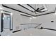 Modern hallway with marble floors and access to bathroom at 517 Treviso Dr, Apollo Beach, FL 33572