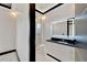 Modern bathroom with a frameless glass shower and floating vanity at 517 Treviso Dr, Apollo Beach, FL 33572