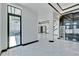 Open concept living area with marble floors and modern design at 517 Treviso Dr, Apollo Beach, FL 33572