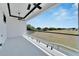 Spacious balcony offering scenic views and ceiling fan at 517 Treviso Dr, Apollo Beach, FL 33572