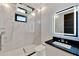 Spa-like bathroom with marble shower and modern vanity at 517 Treviso Dr, Apollo Beach, FL 33572