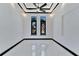 Spacious bedroom with marble floors, ceiling fan and large windows at 517 Treviso Dr, Apollo Beach, FL 33572