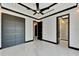 Spacious bedroom with marble floors and modern gray doors at 517 Treviso Dr, Apollo Beach, FL 33572