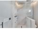 Luxury shower with marble walls and rainfall shower head at 519 Treviso Dr, Apollo Beach, FL 33572