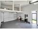 Large garage with high ceilings and extra storage at 519 Treviso Dr, Apollo Beach, FL 33572