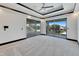 Spacious bedroom with access to balcony and water views at 519 Treviso Dr, Apollo Beach, FL 33572