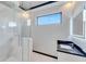 Modern bathroom with marble vanity and glass shower at 519 Treviso Dr, Apollo Beach, FL 33572