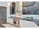 Modern kitchen with stainless steel appliances and sleek cabinetry at 519 Treviso Dr, Apollo Beach, FL 33572