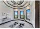Home gym with window views and yoga mats at 519 Treviso Dr, Apollo Beach, FL 33572