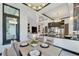 Modern breakfast nook with a view of the living room and kitchen at 519 Treviso Dr, Apollo Beach, FL 33572