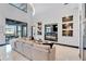 Spacious living area with modern fireplace and built-ins at 519 Treviso Dr, Apollo Beach, FL 33572