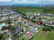 Aerial view of a house and its surrounding neighborhood near Tampa Bay at 519 Treviso Dr, Apollo Beach, FL 33572