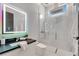 Spa-like bathroom with a frameless shower and modern vanity at 519 Treviso Dr, Apollo Beach, FL 33572