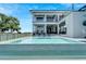 Large, modern pool with a spa and plenty of lounge chairs at 519 Treviso Dr, Apollo Beach, FL 33572