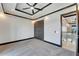 Bright bedroom with ceiling fan and gray carpeting at 519 Treviso Dr, Apollo Beach, FL 33572