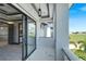 Private balcony with marble flooring and water views at 519 Treviso Dr, Apollo Beach, FL 33572