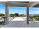 Large balcony with marble floors and water views at 519 Treviso Dr, Apollo Beach, FL 33572