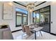 Bright breakfast nook with sliding glass doors leading to an outdoor patio at 519 Treviso Dr, Apollo Beach, FL 33572