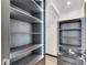 Modern built-in shelving unit with LED lighting at 519 Treviso Dr, Apollo Beach, FL 33572