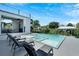 Luxury pool and spa with surrounding patio and lounge chairs at 519 Treviso Dr, Apollo Beach, FL 33572