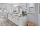 Elegant bathroom with white cabinets and granite countertop at 4302 Deepwater Ln, Tampa, FL 33615