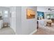 Main bedroom with a view of the pool and access to the bathroom at 4302 Deepwater Ln, Tampa, FL 33615