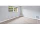 Spacious bedroom with neutral walls and carpet flooring at 4302 Deepwater Ln, Tampa, FL 33615