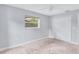 Bright bedroom with neutral walls and carpet flooring at 4302 Deepwater Ln, Tampa, FL 33615