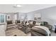 Cozy living room features a sectional sofa and stylish decor at 4302 Deepwater Ln, Tampa, FL 33615