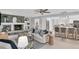 Spacious living room with a stone fireplace and an open concept layout at 4302 Deepwater Ln, Tampa, FL 33615
