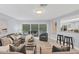 Open living space with sliding doors to the pool area at 4302 Deepwater Ln, Tampa, FL 33615