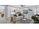Open concept living room with views of the kitchen and dining area at 4302 Deepwater Ln, Tampa, FL 33615