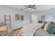 Main bedroom with king bed and sitting area at 4302 Deepwater Ln, Tampa, FL 33615