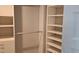 Spacious walk-in closet with ample shelves and hanging space at 4302 Deepwater Ln, Tampa, FL 33615