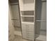 Well-organized walk-in closet with shelves and drawers at 4302 Deepwater Ln, Tampa, FL 33615