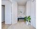 Bright entryway with bench, art, and plant at 20131 Nob Oak Ave, Tampa, FL 33647