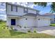 Two-story house with a two car garage and landscaped yard at 20131 Nob Oak Ave, Tampa, FL 33647