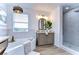 Bathroom with soaking tub, vanity, and walk-in shower at 20131 Nob Oak Ave, Tampa, FL 33647